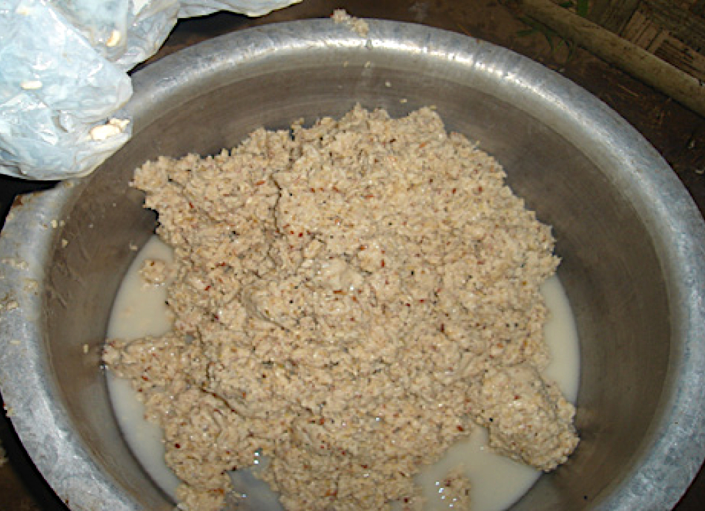 Aos from Nagaland (India). Zutho fermented mash to be diluted and filtered